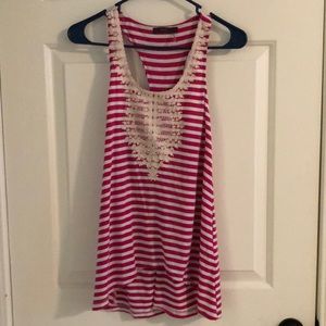 Woman’s pink and white striped tank top